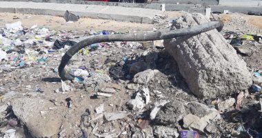 شكوى من تراكم القمامة وانتشار الكابلات المكشوفة بمنطقة حو الجزيرة بالزقازيق