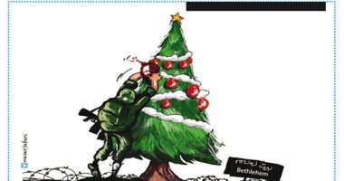 كاريكاتير الصحف الفلسطينية: جندى اسرائيلى يفخخ شجرة عيد الملاد
