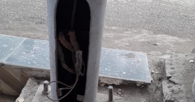 عمود كهرباء مكشوف قرب مدرسة بشارع البوهى فى إمبابة
