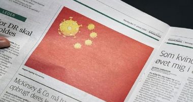 صورة.. صحيفة دنماركية تستبدل نجوم العلم الصينى بـ"فيروسات كورونا"