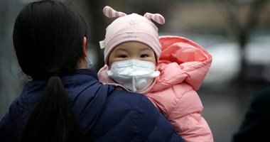 الصين بـ"الكمامة" فى محاولة لحصار فيروس كورونا 