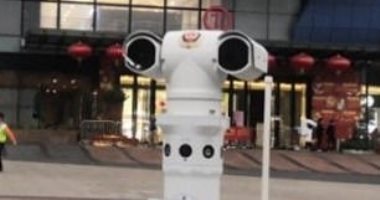 روبوتات تقيس درجات الحرارة وتبلغ الشرطة عن المخالفين في الصين ..صور وفيديو