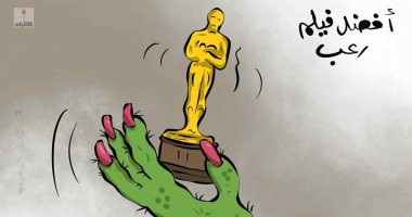 كاريكاتير صحيفة كويتية.. كورونا يفوز بأوسكار أفضل فيلم رعب 
