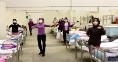 مواجهة الفيروس بالرقص.. مصابو كورونا يرقصون "تاى تشى" أثناء علاجهم فى ووهان