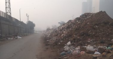 شكوى من تراكم القمامة ومخلفات البناء بشارع الجسر البرانى بدار السلام