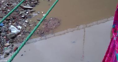 تراكم مياه الأمطار مع الصرف الصحي بشارع حساد عزبة النخل الغربية