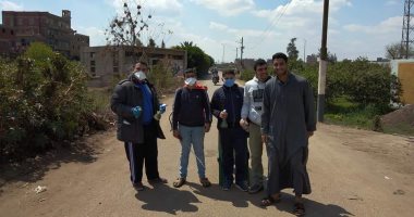 صور ..شباب قرية دندنا بطوخ القليوبية يتطوعون لتطهير مداخل وشوارع القرية