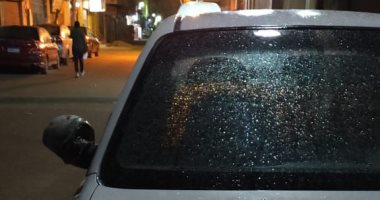 صور.. سقوط أمطار خفيفة على منطقة فيصل بالجيزة 