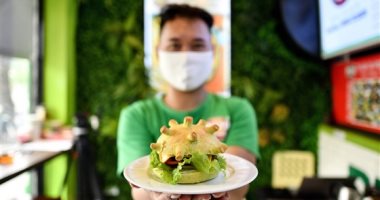 كورونا برجر.. مطعم فيتنامى يبتكر ساندوتش بشكل الفيروس التاجى.. صور