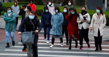 عودة الحياة جزئيا إلى شوارع بكين بعد انحسار خطر فيروس كورونا