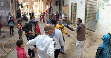 حملة شبابية بقرية منشأة دياب بالقليوبية لتعقيم وتطهير الشوارع