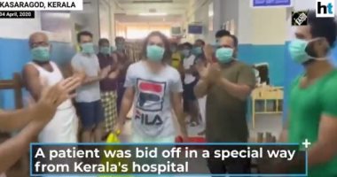 "بالتصفيق والهتاف" موظفو مستشفى هندى يدشنون ممر شرفي لمريض تعافى من كورونا 