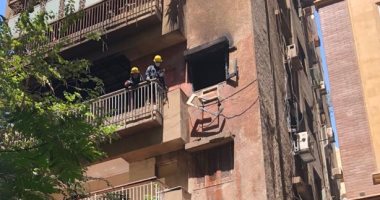 وفاة مسنة و4 أطفال في حريق شقة بالدقى.. صور