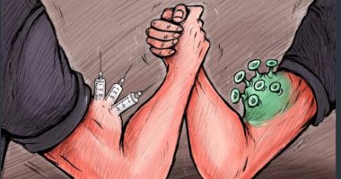كاريكاتير صحيفة إماراتية.. كورونا.. والتحدى لعلاج الفيروس