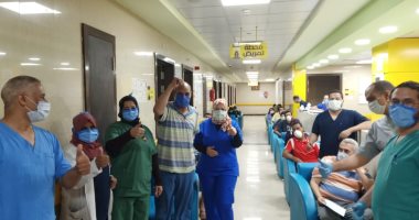 خروج 22 حالة عقب تعافيهم من كورونا بمستشفى إسنا للحجر الصحى.. صور