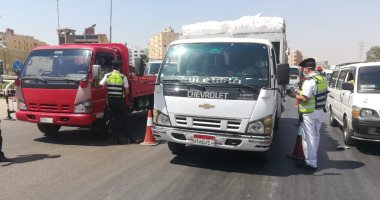 حملات مرورية لرصد المخالفات بمحاور القاهرة والجيزة 