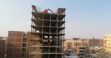 محافظة القاهرة تستخدم "جاك هامر" لرفع معدات هدم أعلى الأبراج المخالفة 