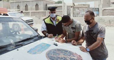 حملات مرورية بمحاور القاهرة والجيزة لرصد المخالفين لقواعد المرور