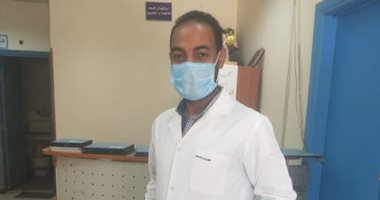 "رجب" أخصائى أشعة بمستشفى أوسيم المركزى على خط المواجهة ضد كورونا