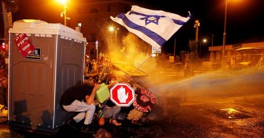 اشتباكات بين قوات الأمن الإسرائيلية ومحتجين ضد فساد نتنياهو × 10 صور