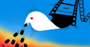 كاريكاتير صحيفة إماراتية.. الإرهاب يلقى بسمومه من وراء حمامة السلام 