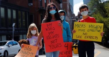 أمهات وأطفال بوسطن الأمريكية يرفضون التطعيم الإجباري ضد الأنفلونزا.. ألبوم صور