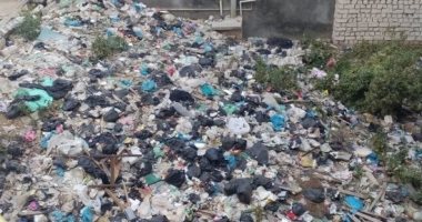 شكوى من تراكم القمامة فى شارع أبو بكر الصديق بالعجمى بالاسكندرية