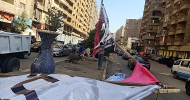 محافظة الجيزة تزيل دعاية انتخابية مخالفة بحى الهرم