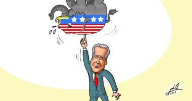 جو بايدن يحمل الفيل بصباع عقب فوزه بالانتخابات في كاريكاتير لبنانى