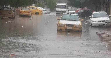 غرق شوارع بغداد في مياه السيول والأمطار الغزيرة.. فيديو وصور