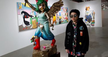 فنانة تايلاندية تجسد انتصار المتظاهرين بتمثال مجنح..البوم صور