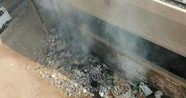 سكان العمرانية الشرقية بالجيزة يشكون انتشار القمامة والمحافظة تستجيب .. صور