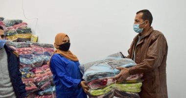 توزيع 1200 بطانية على عمال الجامعة ومشروع النظافة ببنى سويف