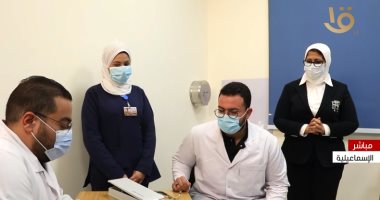 وزيرة الصحة تشهد تلقى الأطقم الطبية لأول جرعة لقاح ضد كورونا.. صورة