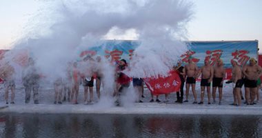 الجليد الصينى سباحة وسياحة...العوم تحت الصفر  فى احتفالات السنة القمرية الجديدة..ألبوم صور