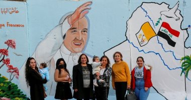صور.. العراق يترقب زيارة البابا فرانسيس وصوره تنتشر على الحوائط