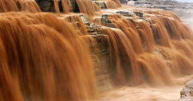 شلالات ملونة وكهوف صخرية قديمة.. النهر الأصفر مهد الحضارة الصينية..ألبوم صور