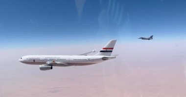 Iraqi warplanes escort President Sisi's plane as it enters the airspace of Iraq