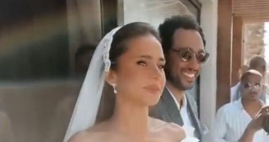 نيللي كريم وهشام عاشور يطلان بالأبيض في اللحظات الأولى لحفل الزفاف.. فيديو 