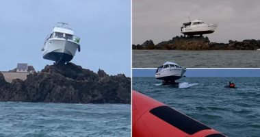 سر ظهور قارب فوق الصخور في عرض البحر بجزيرة القنال الإنجليزية .. صور