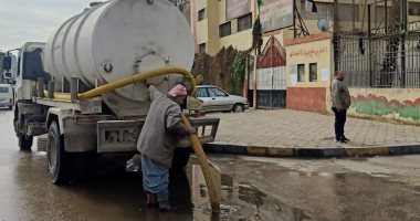 نظافة الجيزة ترفع آثار مياه الأمطار من الشوارع.. صور