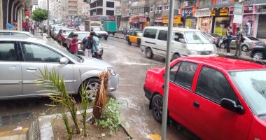 أمطار خفيفة تغازل شوارع الإسكندرية