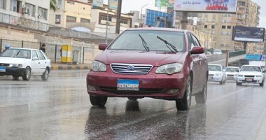 سقوط أمطار متفاوتة الشدة على مناطق متفرقة بالقاهرة والجيزة