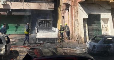 صور.. الحماية المدنية تجرى عمليات تبريد لموقع حريق مخزن سيارات بشبرا