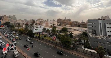 غيوم فى سماء القاهرة والجيزة وأمطار خفيفة على فترات متقطعة 