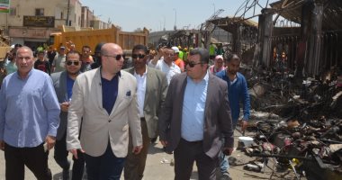 محافظ بنى سويف يتفقد أعمال رفع آثار حريق المعرض التجارى تمهيداً لإعادة البناء