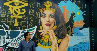 "أحمد" زين شوارع بورسعيد بجدارية ضخمة بروح فرعونية مرسومة بطريقة معاصرة