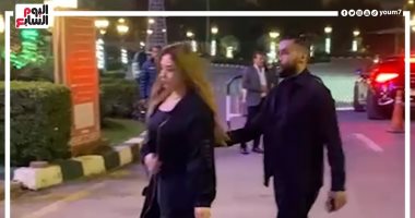Hosam Ashour and his wife console the son of artist Tariq Abdel Aziz with his father.. VIDEO