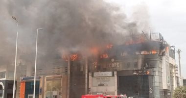 الاستماع لأقوال شهود العيان في حريق مجمع بنوك بالتجمع