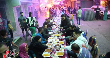 إفطار فيصل.. المئات ينظمون حفل إفطار جماعى بالجيزة